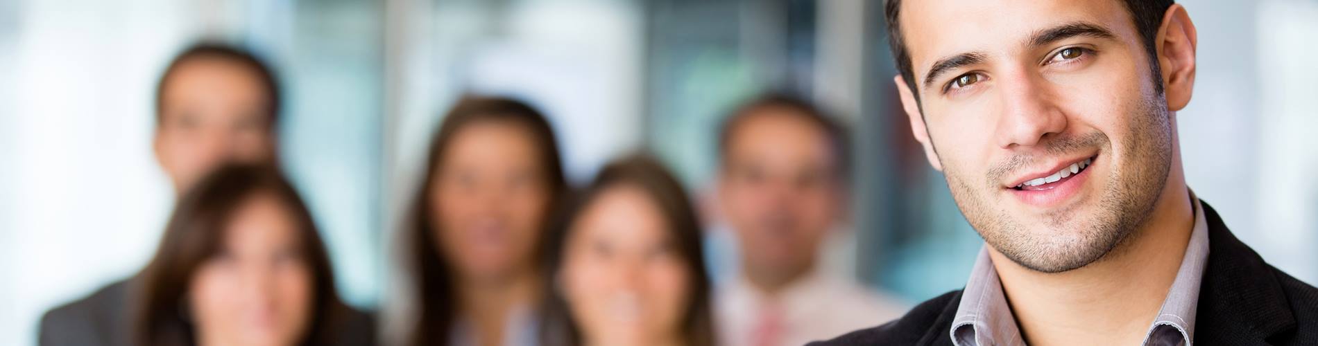 ManwithPeopleBehindHisBack